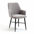 Upholstered dining chair with black metal legs and gray fabric finish